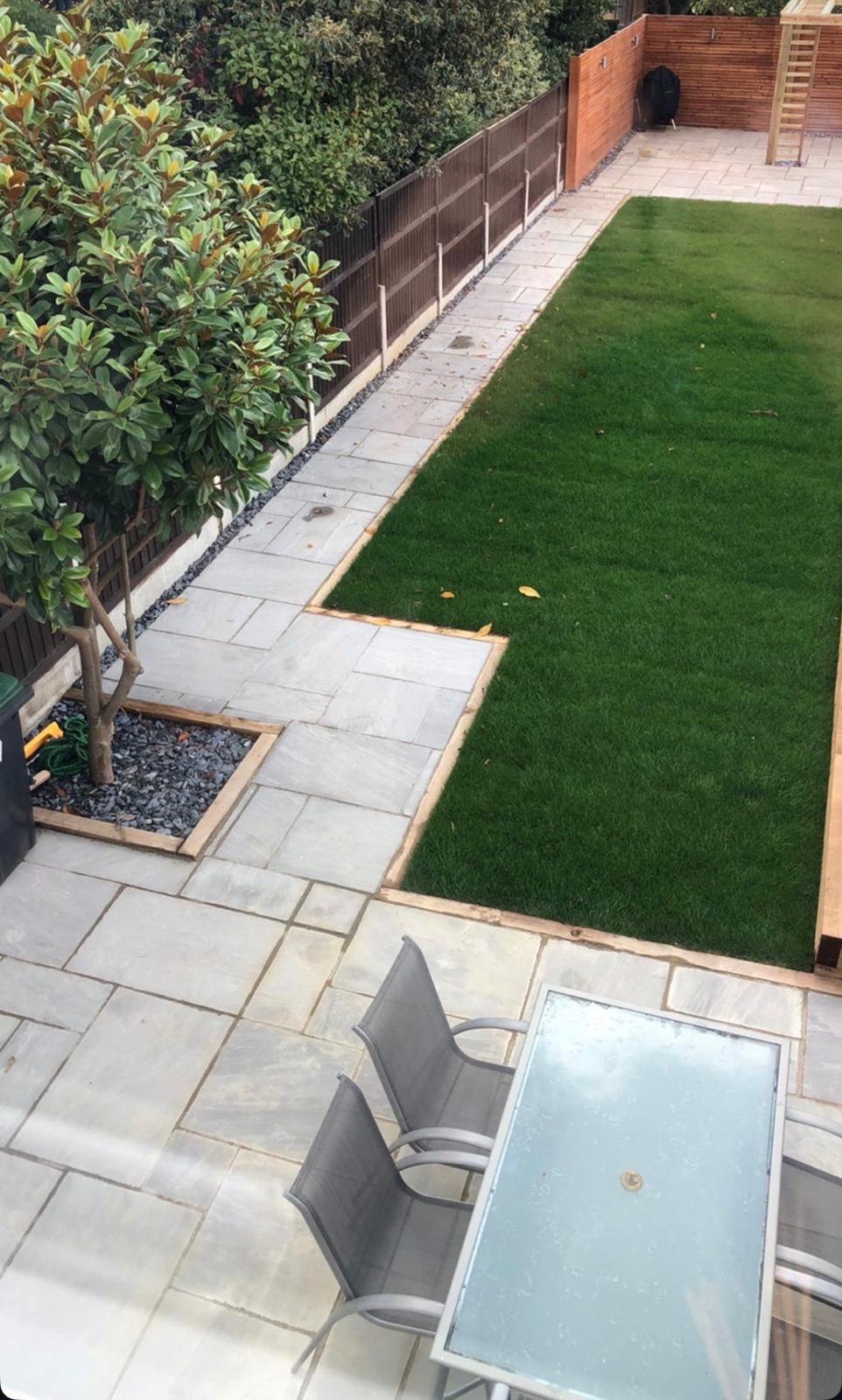 Garden with turf and stone path